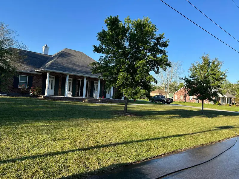 Fresh sod installation by Southern Grounds LLC, transforming a New Orleans backyard with lush, green, and healthy grass.