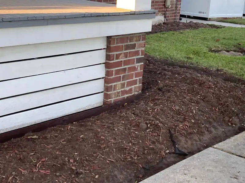 Southern Grounds LLC's landscaping work displaying a perfectly manicured garden with a mix of ornamental shrubs and flowering plants in New Orleans.