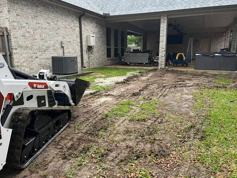 Fresh sod installation by Southern Grounds LLC, transforming a New Orleans backyard with lush, green, and healthy grass.