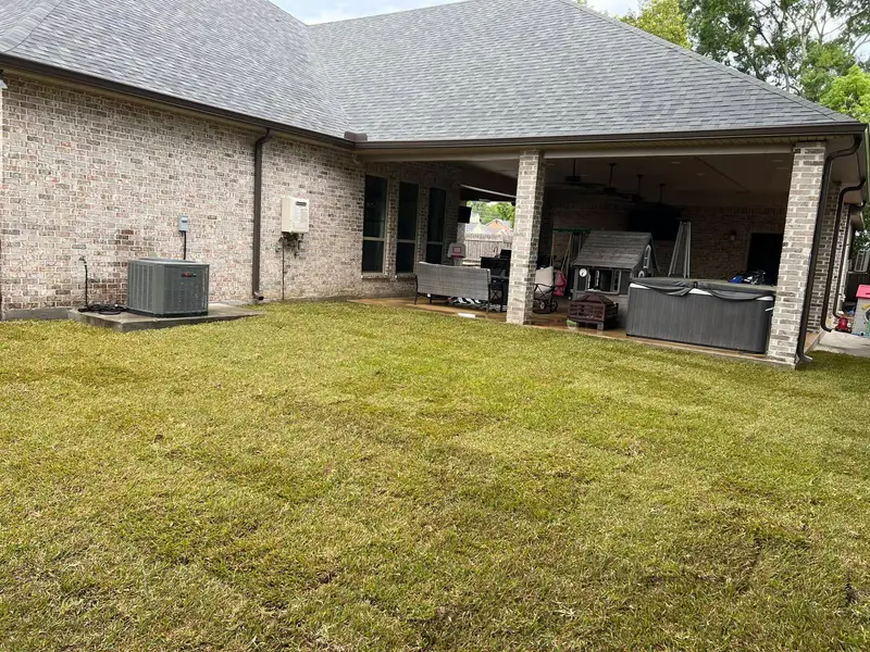 Fresh sod installation by Southern Grounds LLC, transforming a New Orleans backyard with lush, green, and healthy grass.
