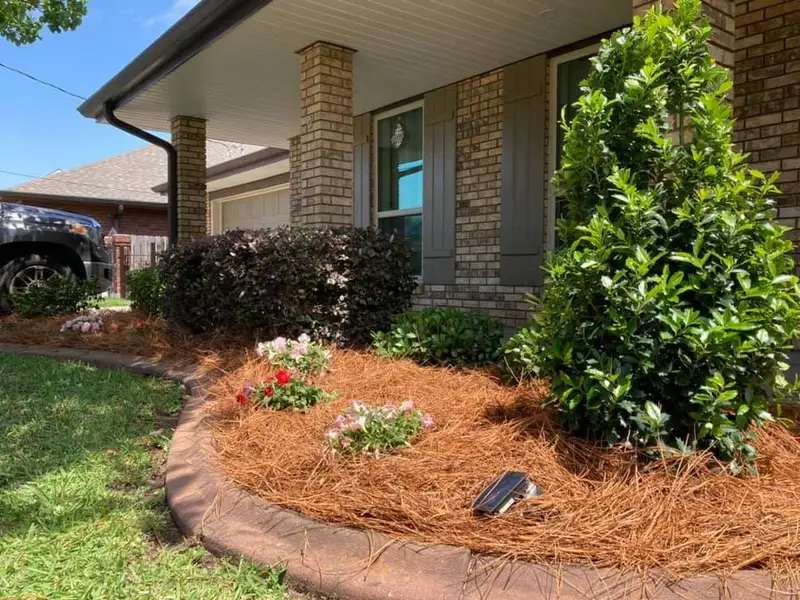 Beautiful landscaping flowerbeds with mulch crafted and installed by Southern Grounds, LLC in the greater new orleans area