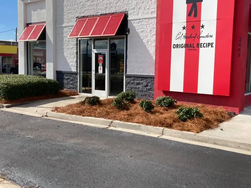 Beautiful landscaping flowerbeds with mulch crafted and installed by Southern Grounds, LLC in the greater new orleans area
