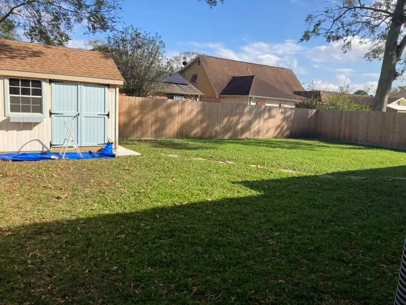Beautiful landscaping flowerbeds with mulch crafted and installed by Southern Grounds, LLC in the greater new orleans area