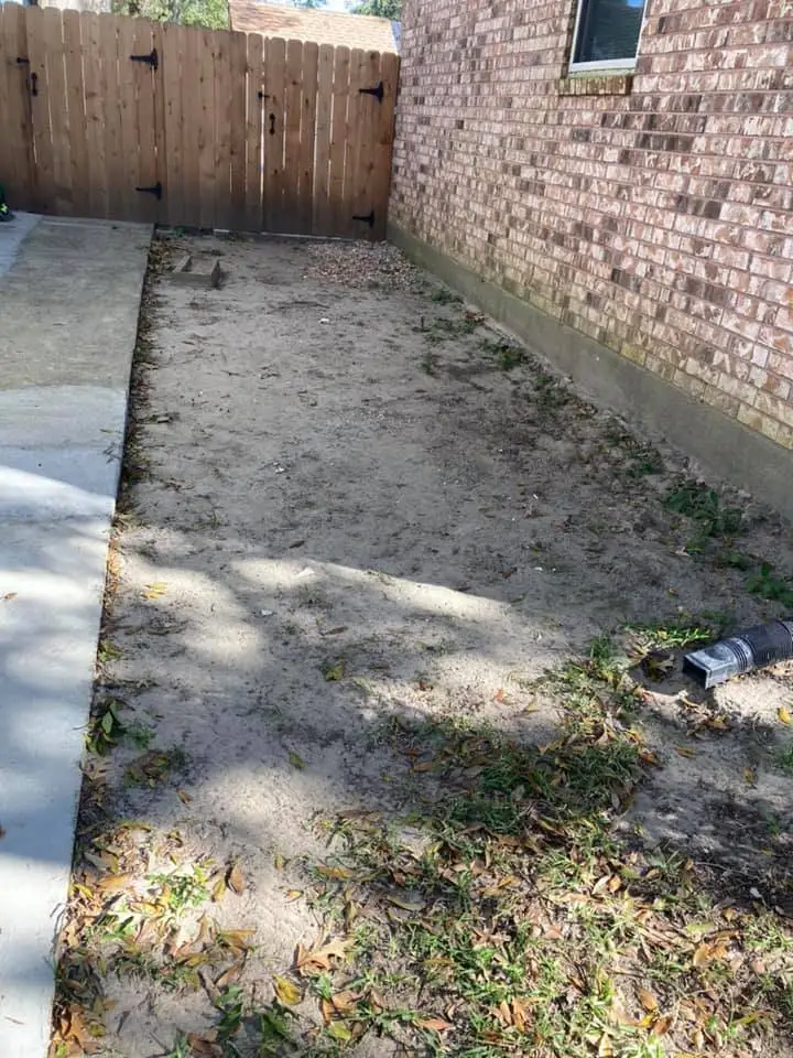 Beautiful landscaping flowerbeds with mulch crafted and installed by Southern Grounds, LLC in the greater new orleans area