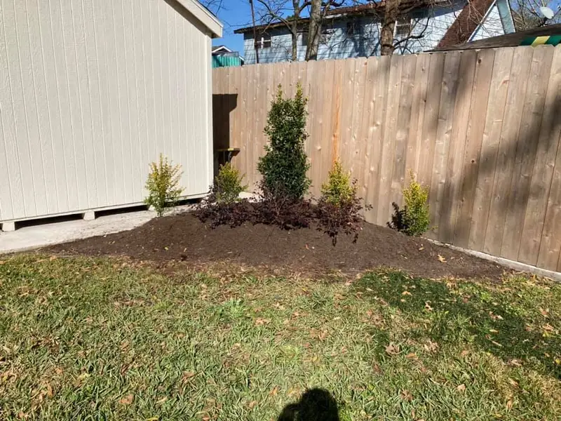Beautiful landscaping flowerbeds with mulch crafted and installed by Southern Grounds, LLC in the greater new orleans area