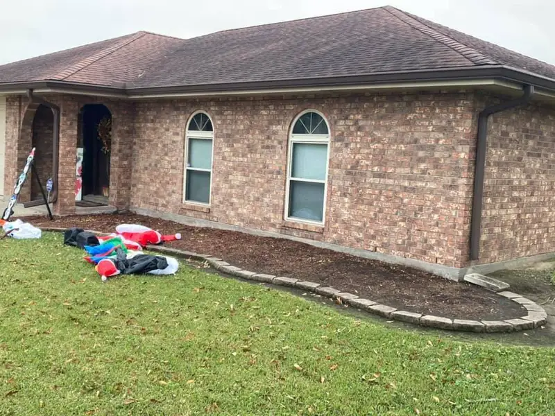 Beautiful landscaping flowerbeds with mulch crafted and installed by Southern Grounds, LLC in the greater new orleans area
