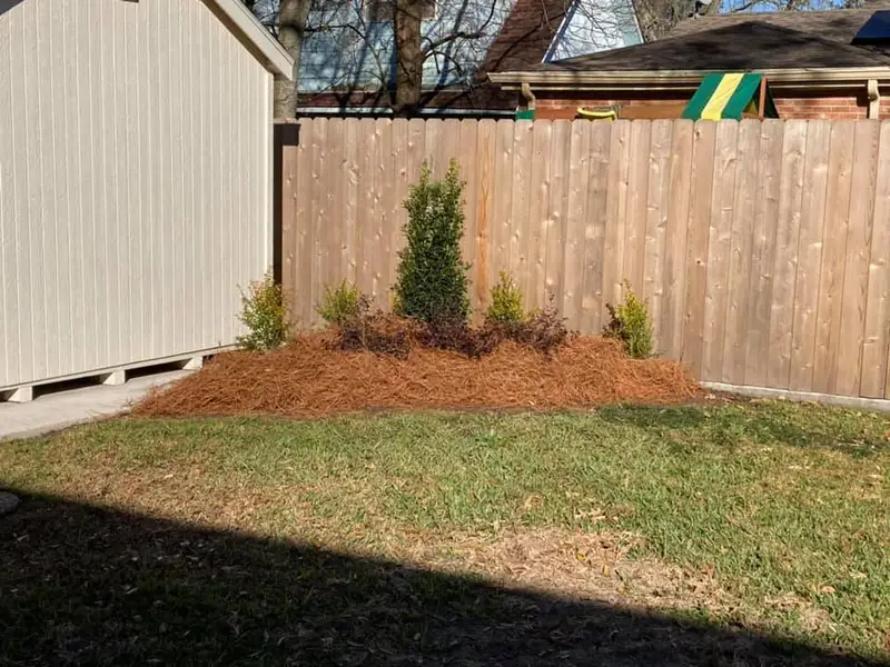 Beautiful landscaping flowerbeds with mulch crafted and installed by Southern Grounds, LLC in the greater new orleans area