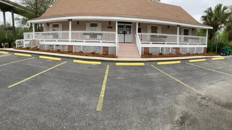 Beautiful landscaping flowerbeds with mulch crafted and installed by Southern Grounds, LLC in the greater new orleans area