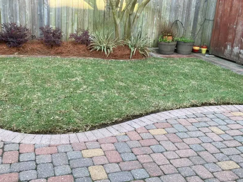 Beautiful landscaping flowerbeds with mulch crafted and installed by Southern Grounds, LLC in the greater new orleans area
