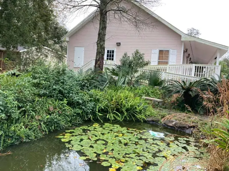 Beautiful landscaping flowerbeds with mulch crafted and installed by Southern Grounds, LLC in the greater new orleans area